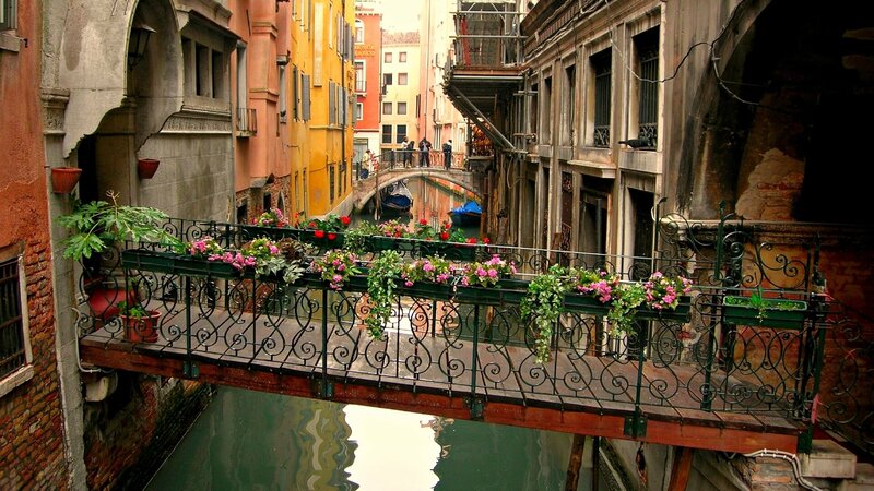 Colorful canal bridge in Venice