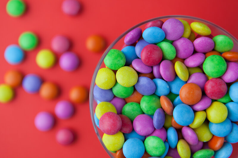 Colorful Candies in Bowl — Red
