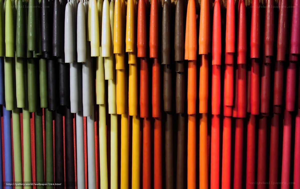 Colorful candles arranged in rows