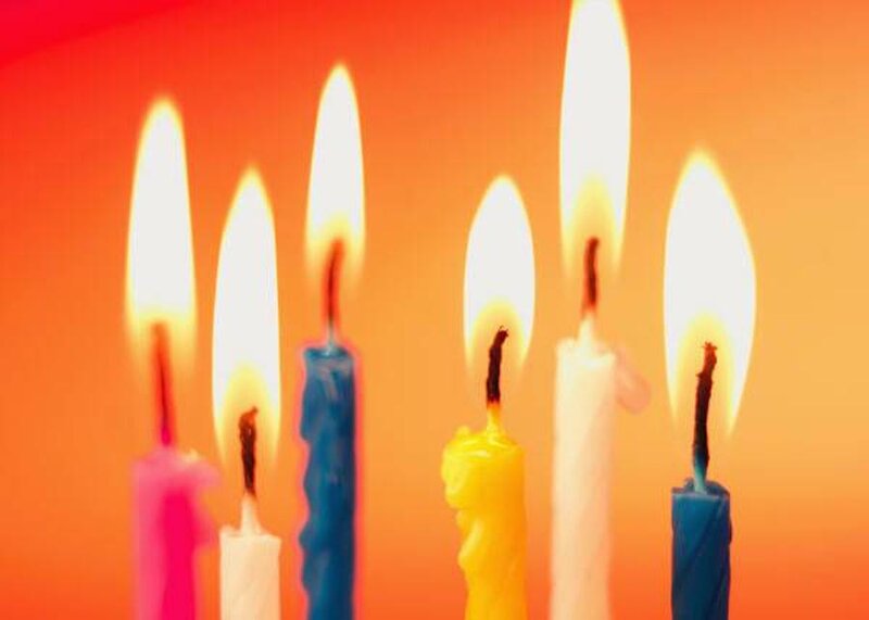 colorful candles on orange