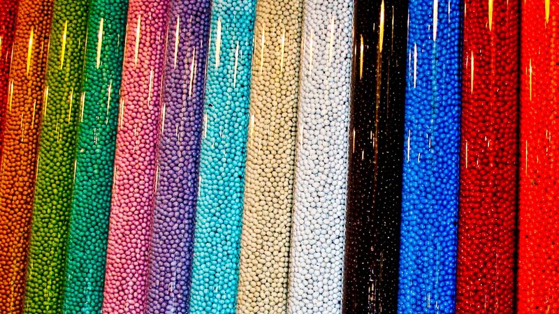 Colorful candy beads in tubes