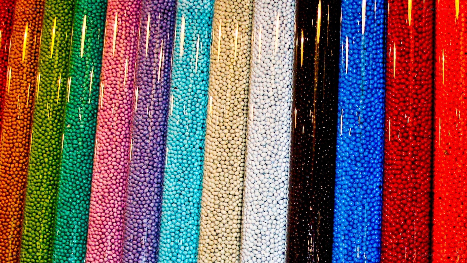 Colorful candy beads in tubes
