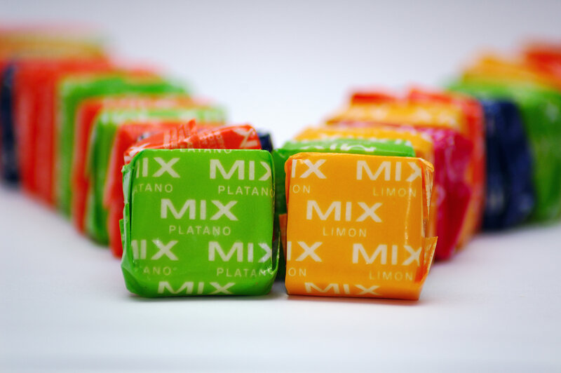 Colorful candy wrappers in rows