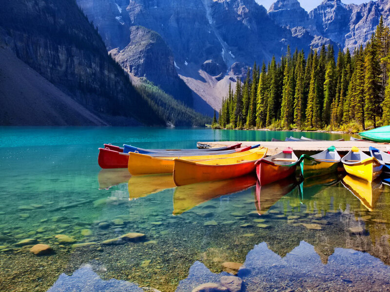 Colorful Canoes at Lake — Blue, Serene