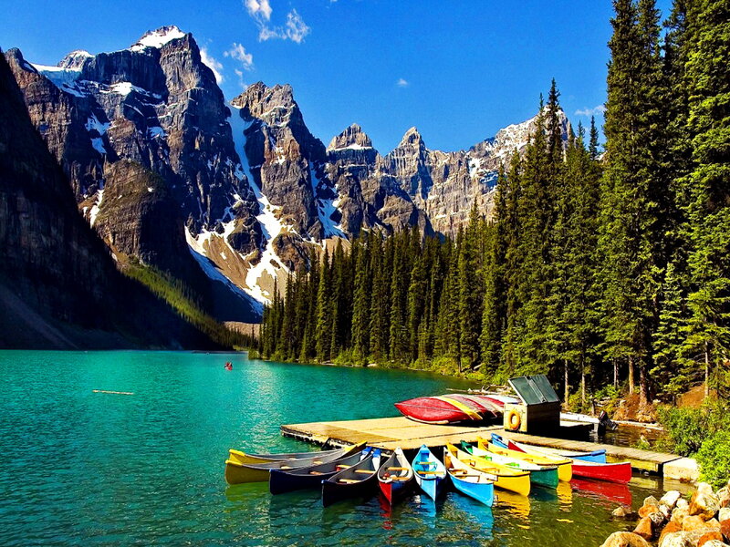 Colorful Canoes at Lake — Blue