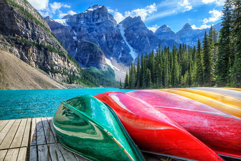Colorful Canoes on Dock