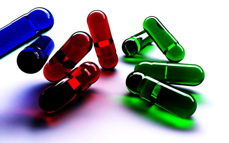 Colorful Capsules on White — Blue