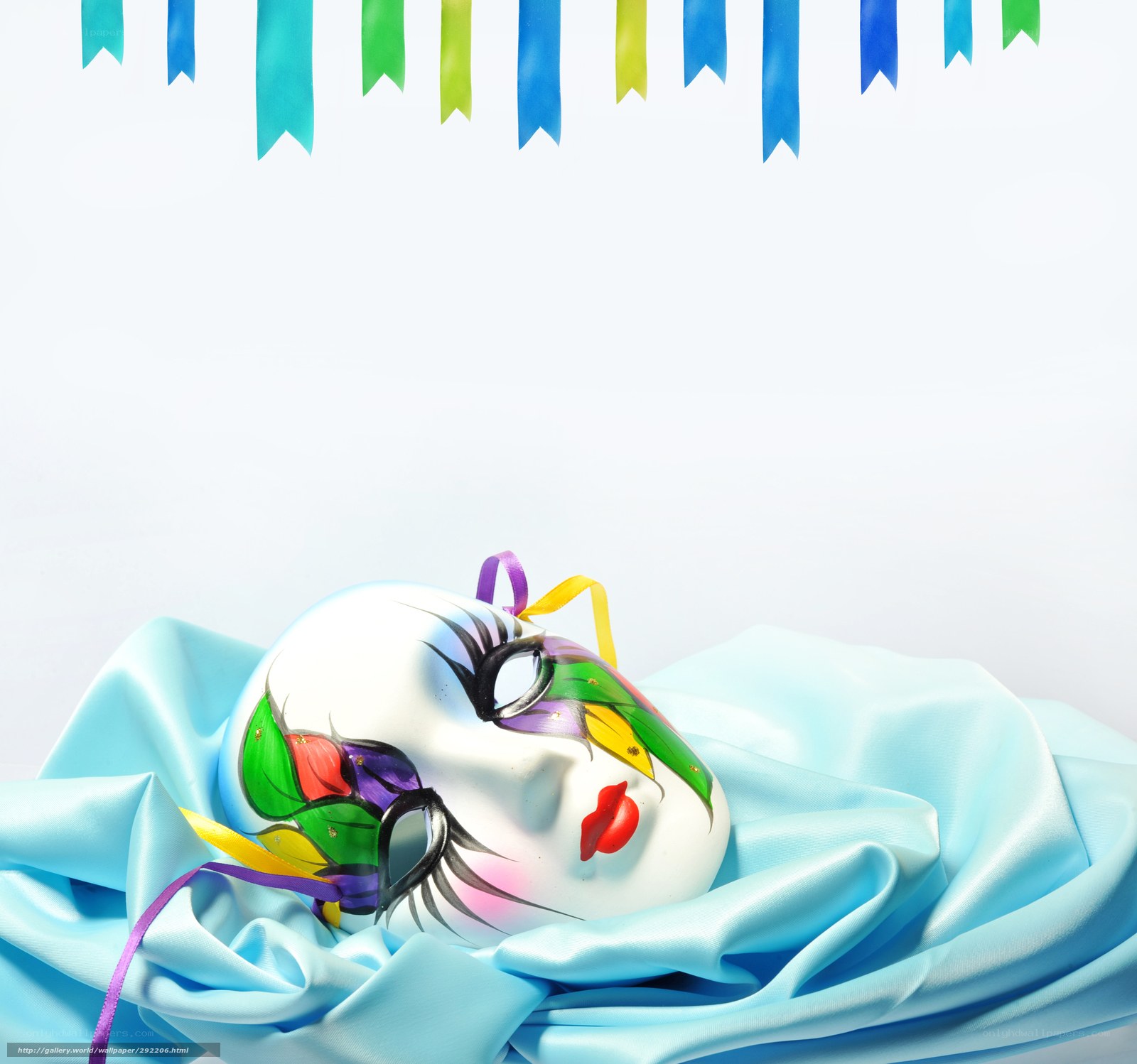 colorful carnival mask on blue cloth