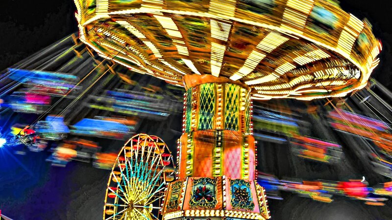 Colorful carnival ride at night