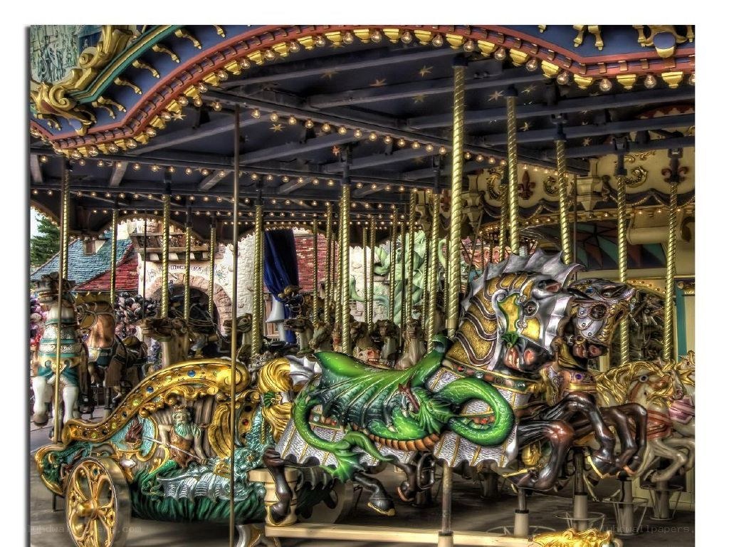 Colorful carousel with dragons and horses
