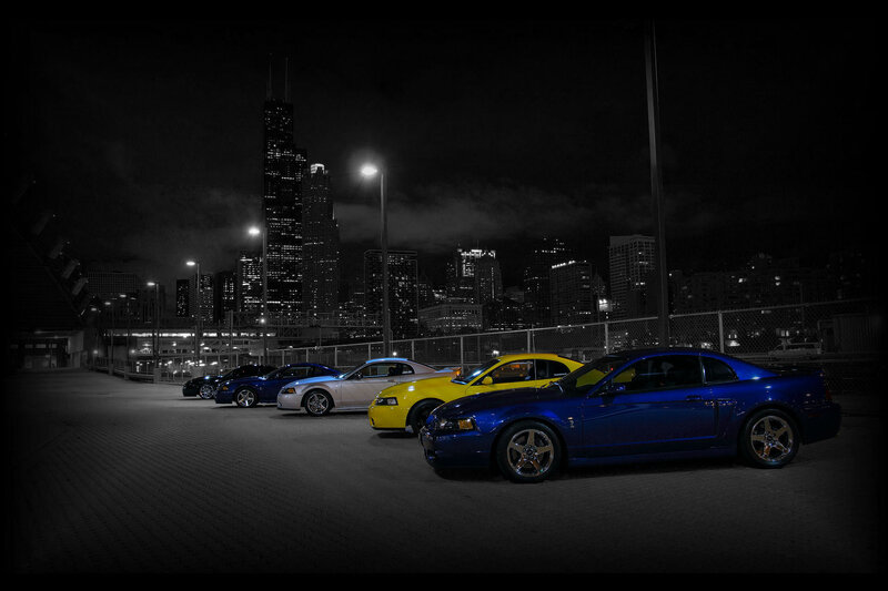 Colorful cars at night in city