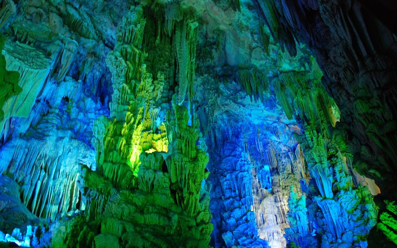 Colorful cave formations lit up