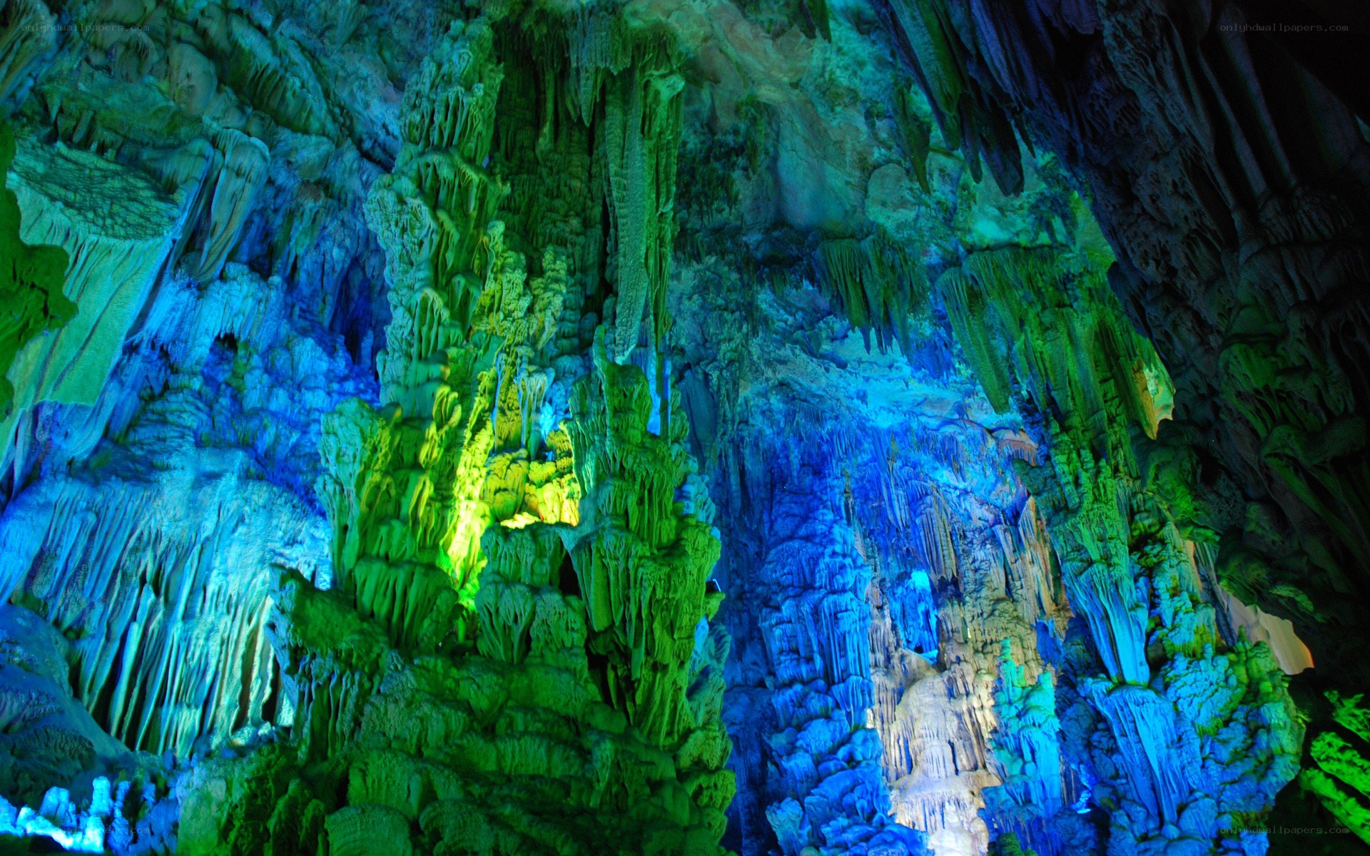 Colorful cave formations lit up
