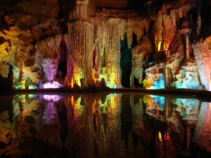 Colorful cave with stalactites