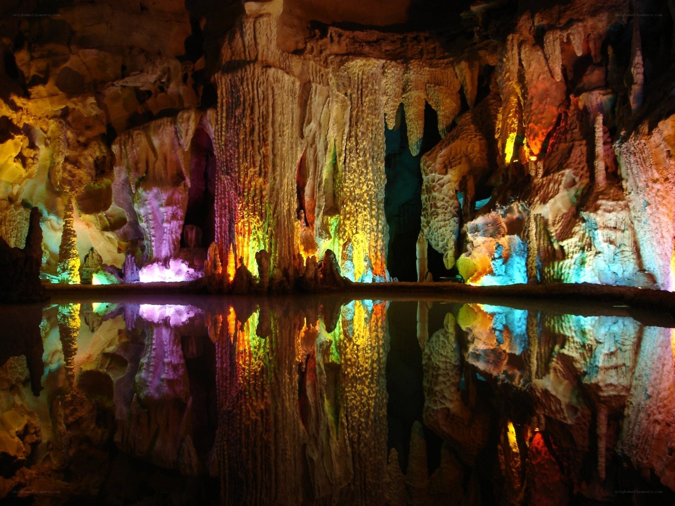 Colorful cave with stalactites