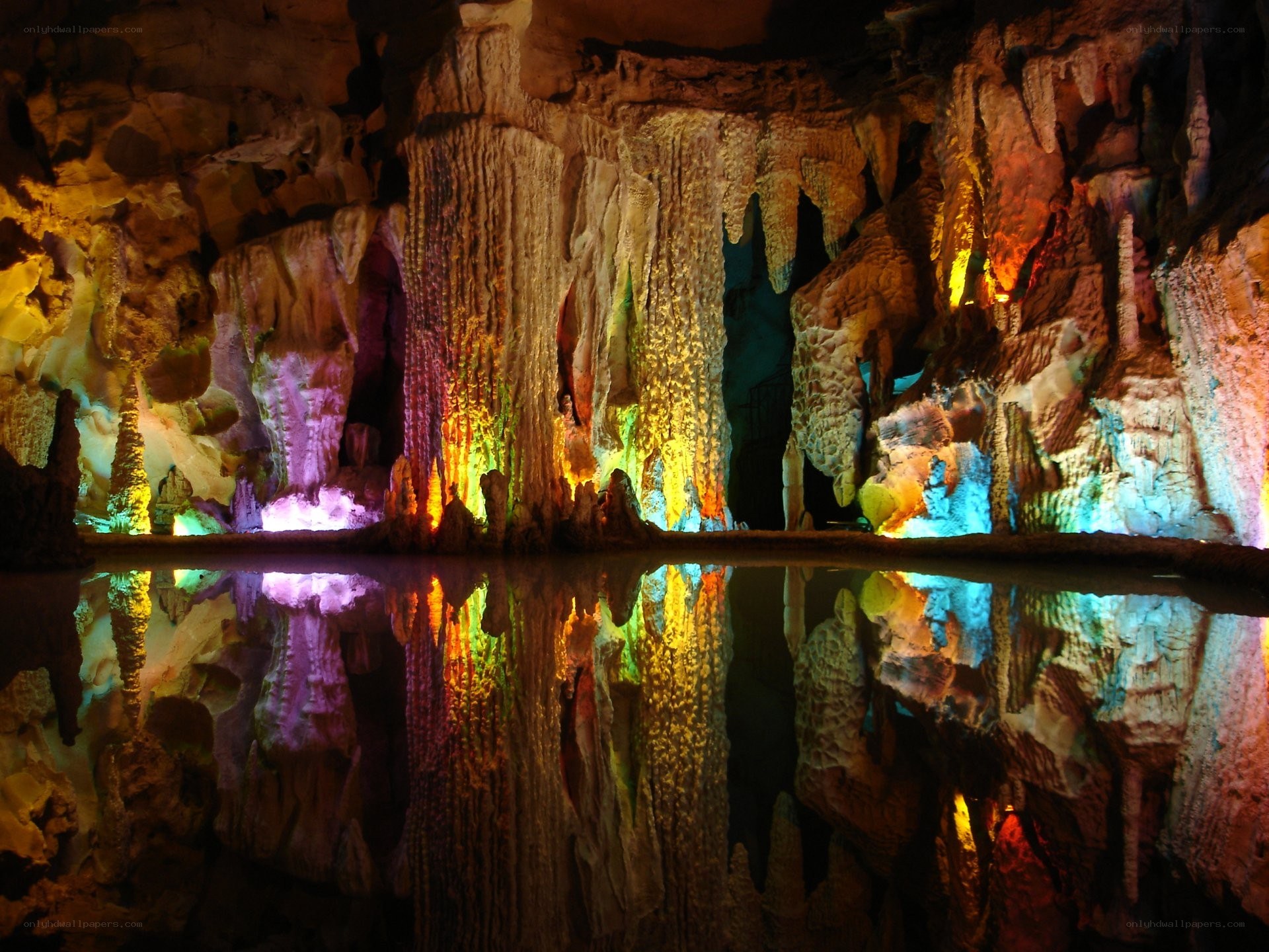 Colorful cave with stalactites