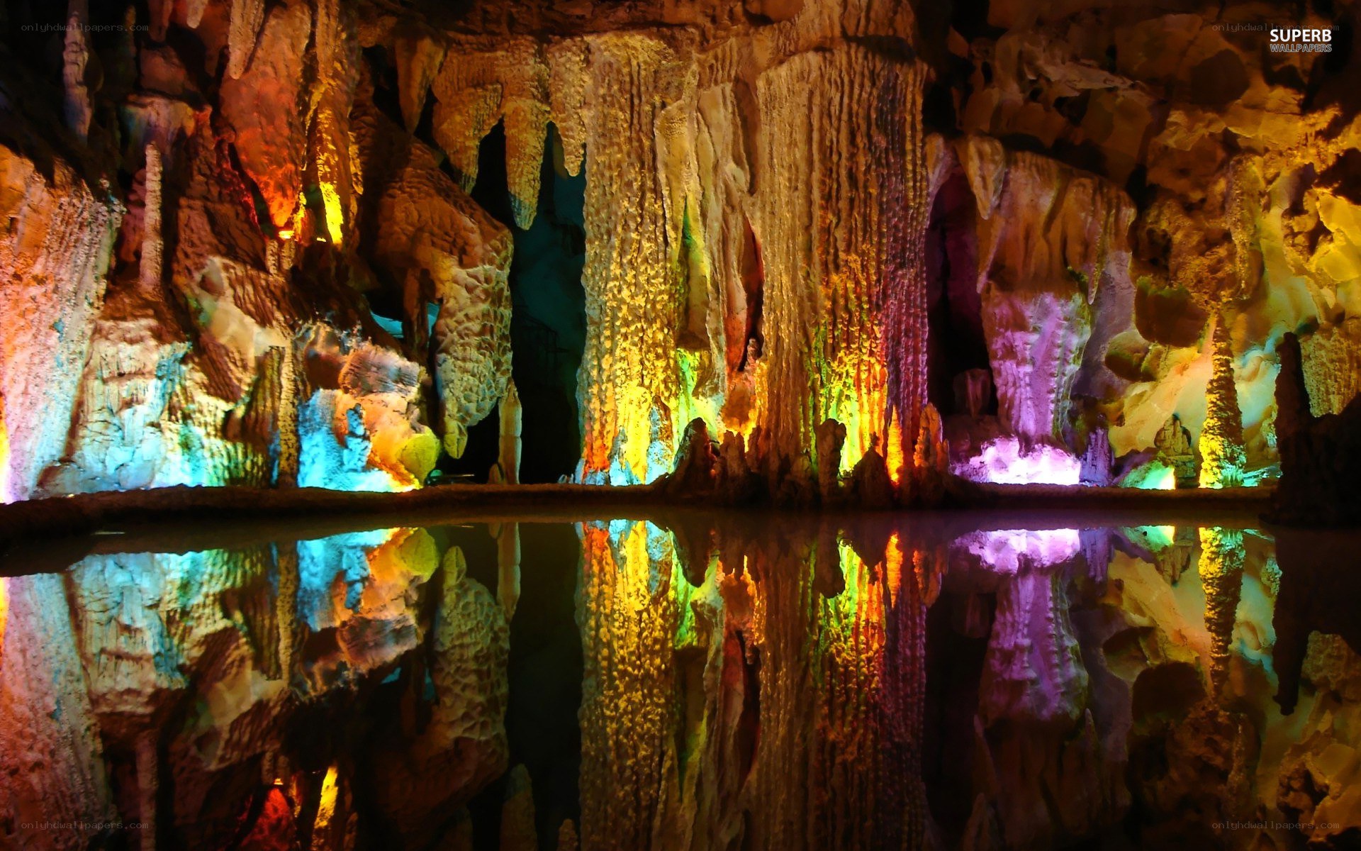 Colorful cave with water reflection