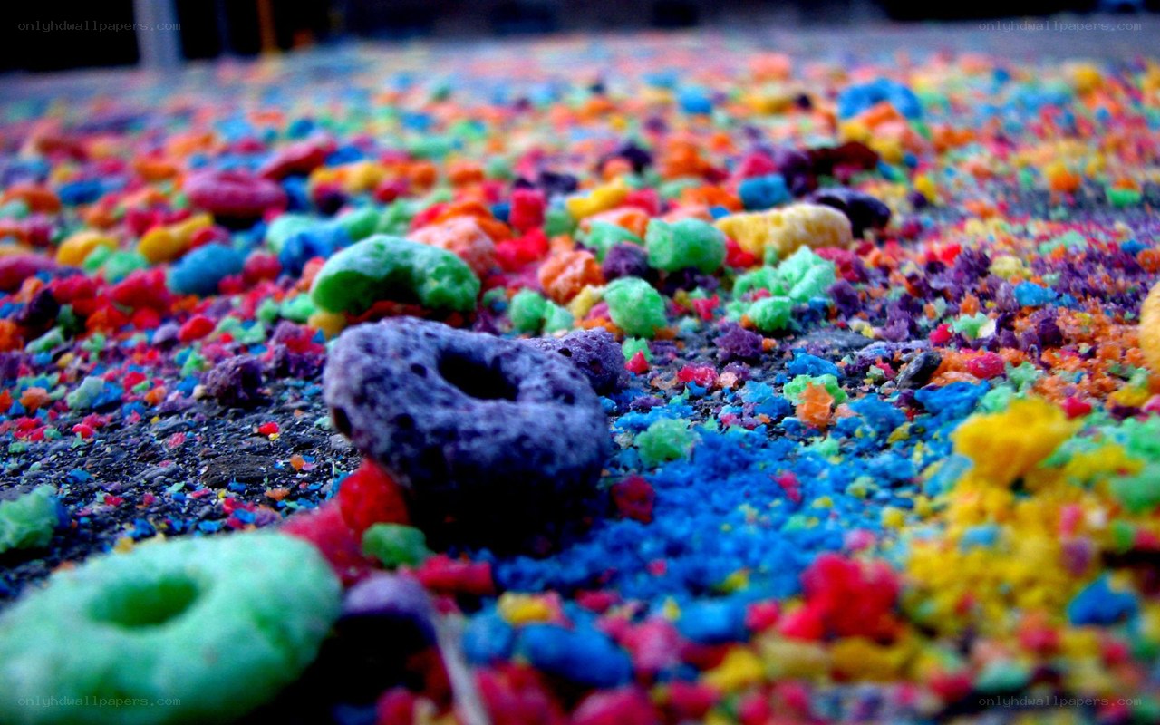 Colorful cereal on pavement