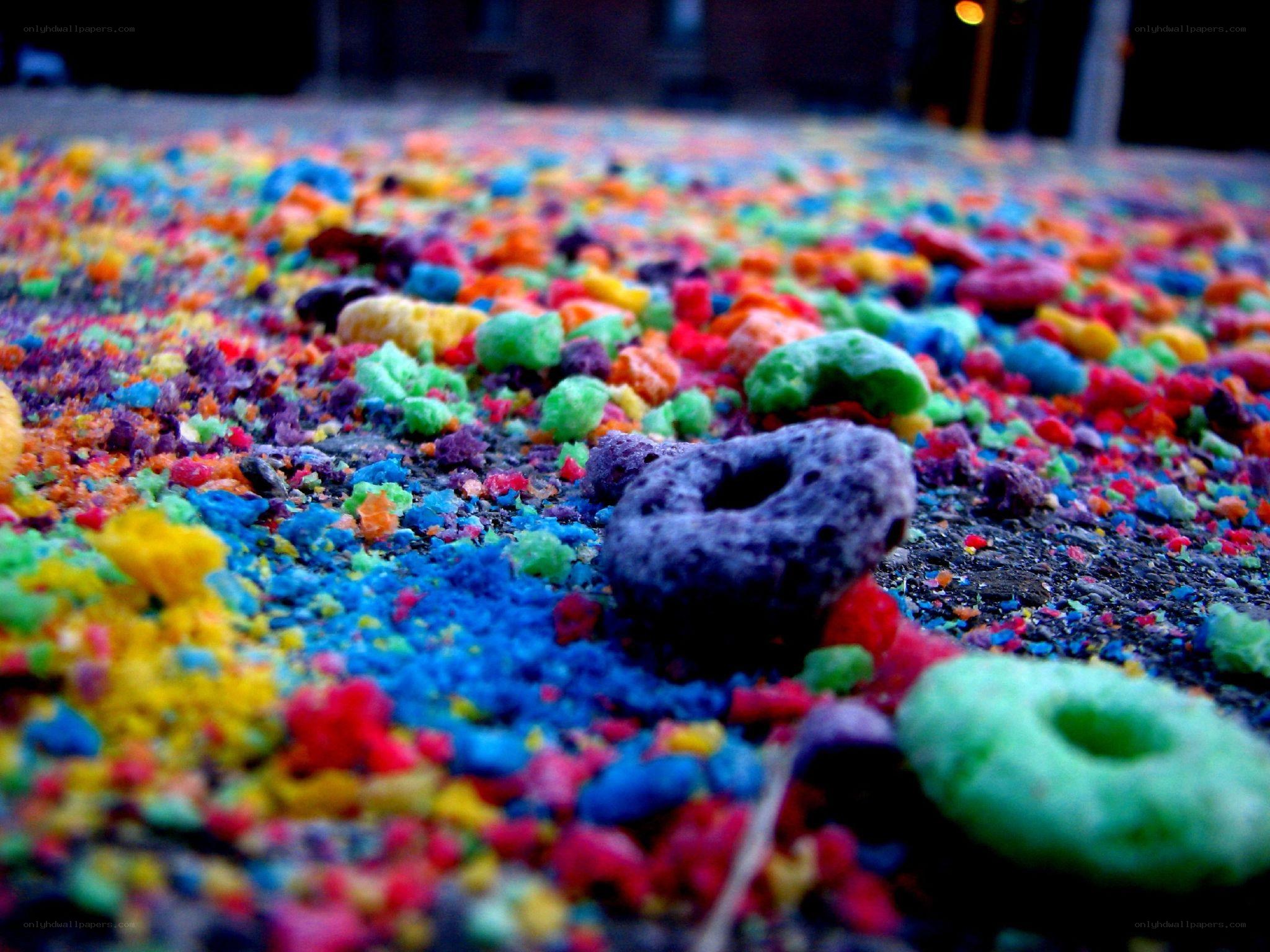 Colorful cereal scattered on ground