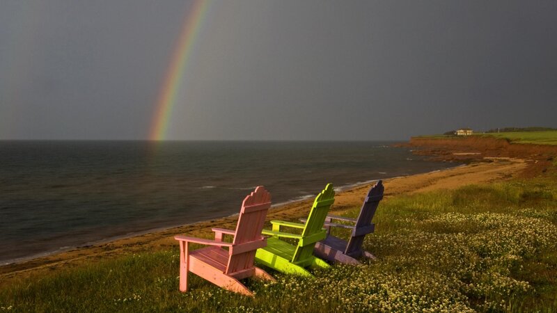 Colorful chairs by the sea