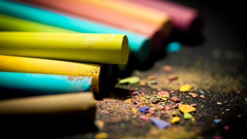 Colorful chalk sticks and shavings