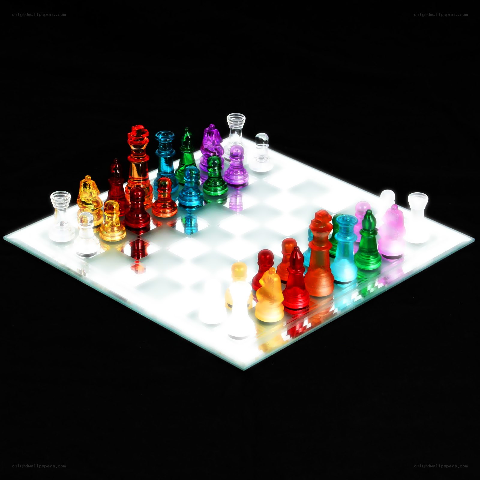 Colorful chess set on glowing board