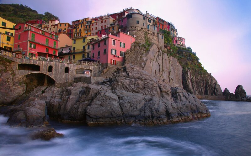 Colorful cliffside village by the sea