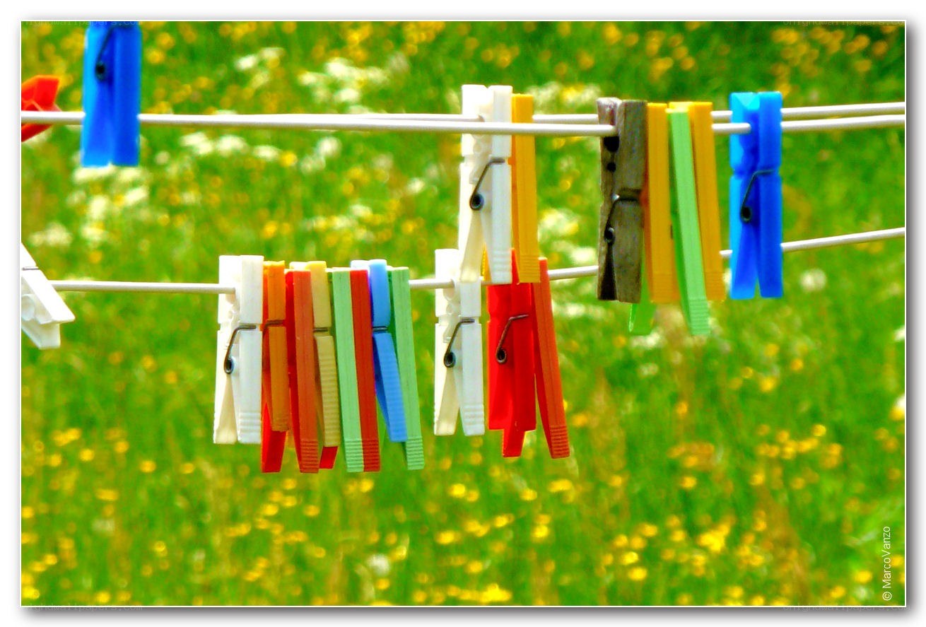 Colorful clothespins on a line
