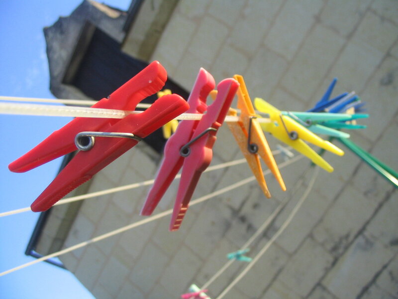Colorful clothespins on a line