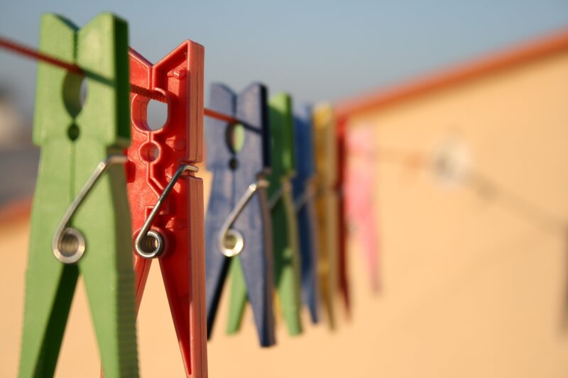 Colorful Clothespins on Line — Green, Calm