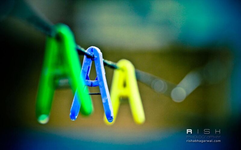 Colorful Clothespins on Line — Green