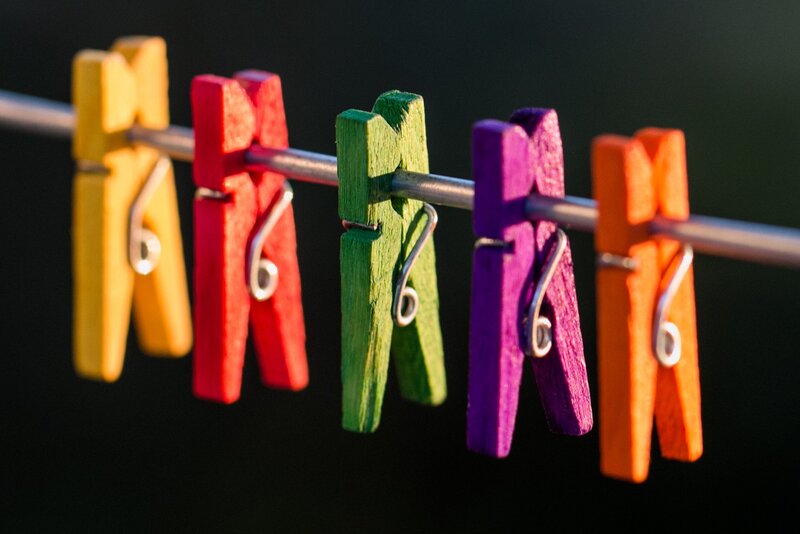 Colorful Clothespins on Line — Yellow