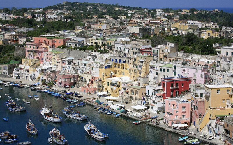 colorful coastal town with boats