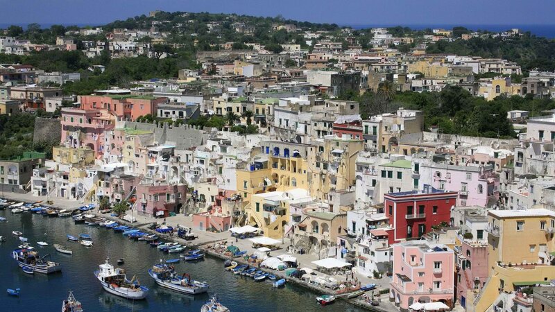 colorful coastal town with boats
