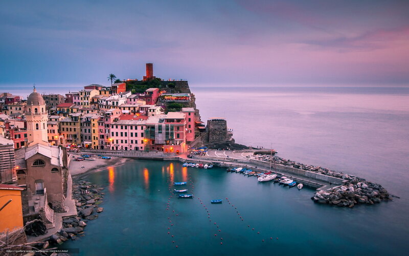 Colorful coastal village at dusk