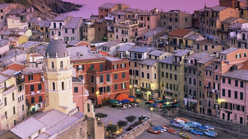 Colorful coastal village at dusk
