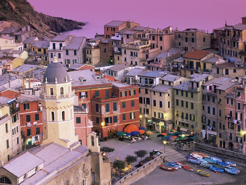 Colorful coastal village at dusk
