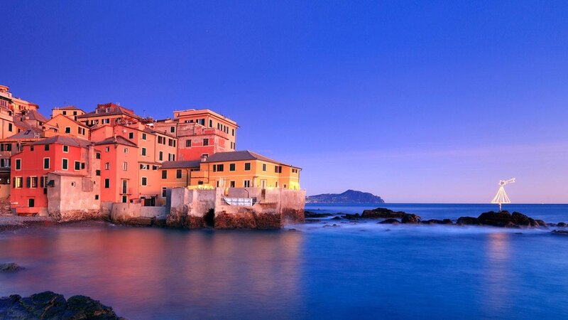 Colorful coastal village at dusk