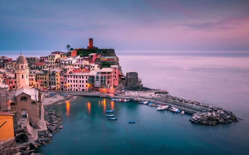 Colorful coastal village at dusk