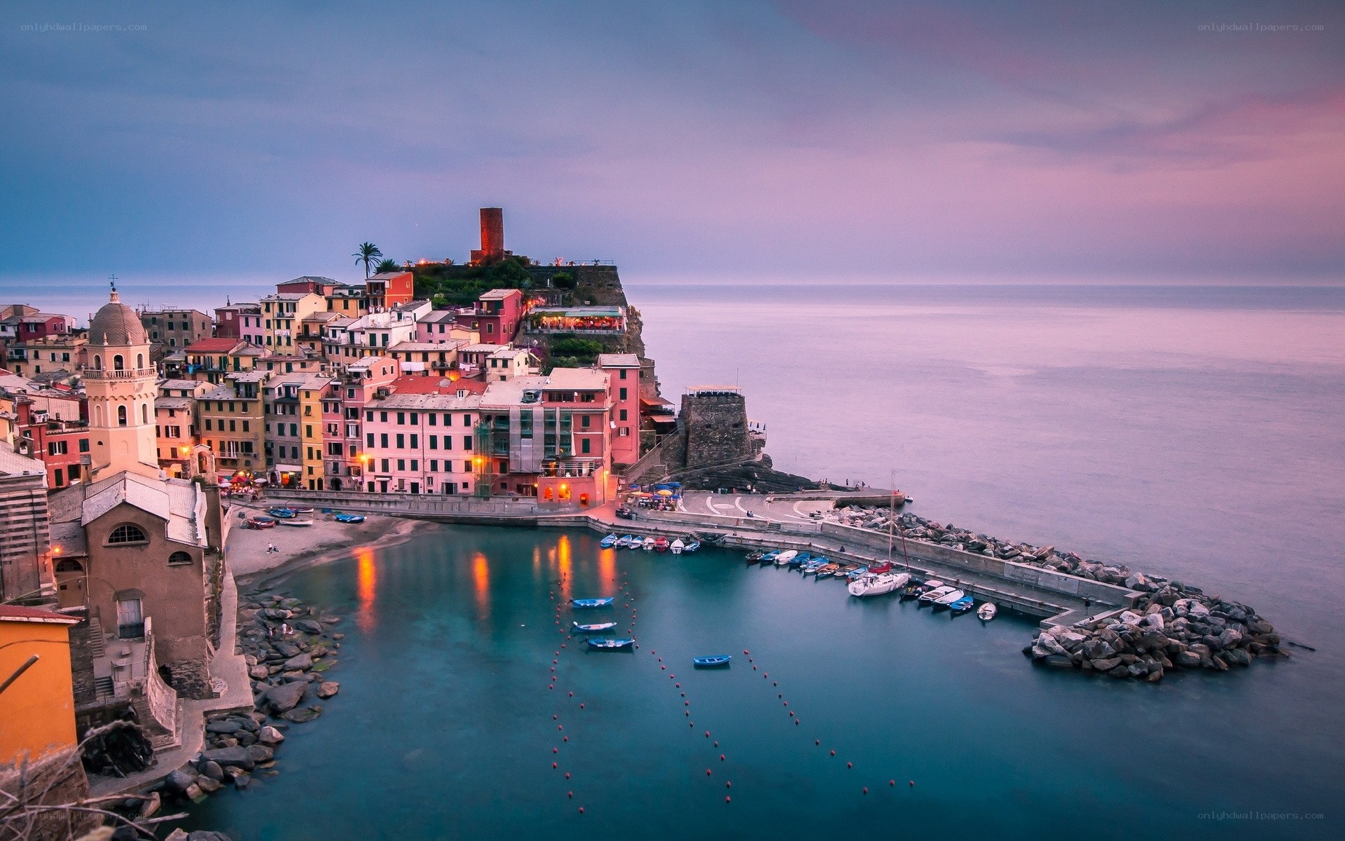 Colorful coastal village at dusk