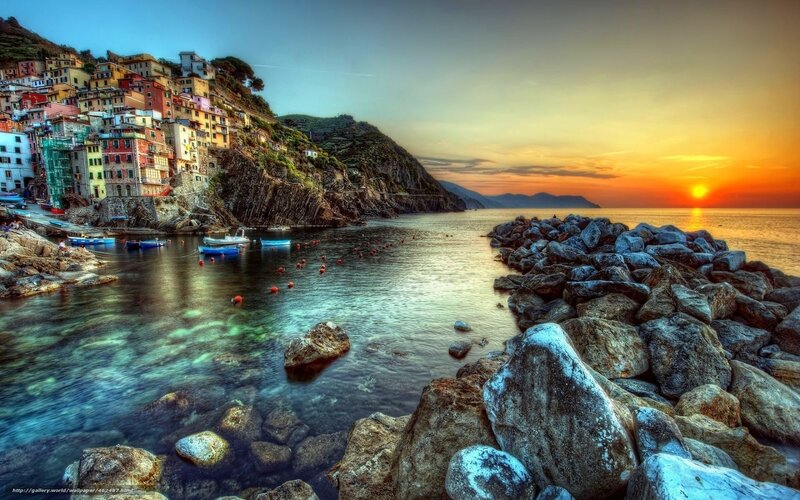 Colorful coastal village at sunset