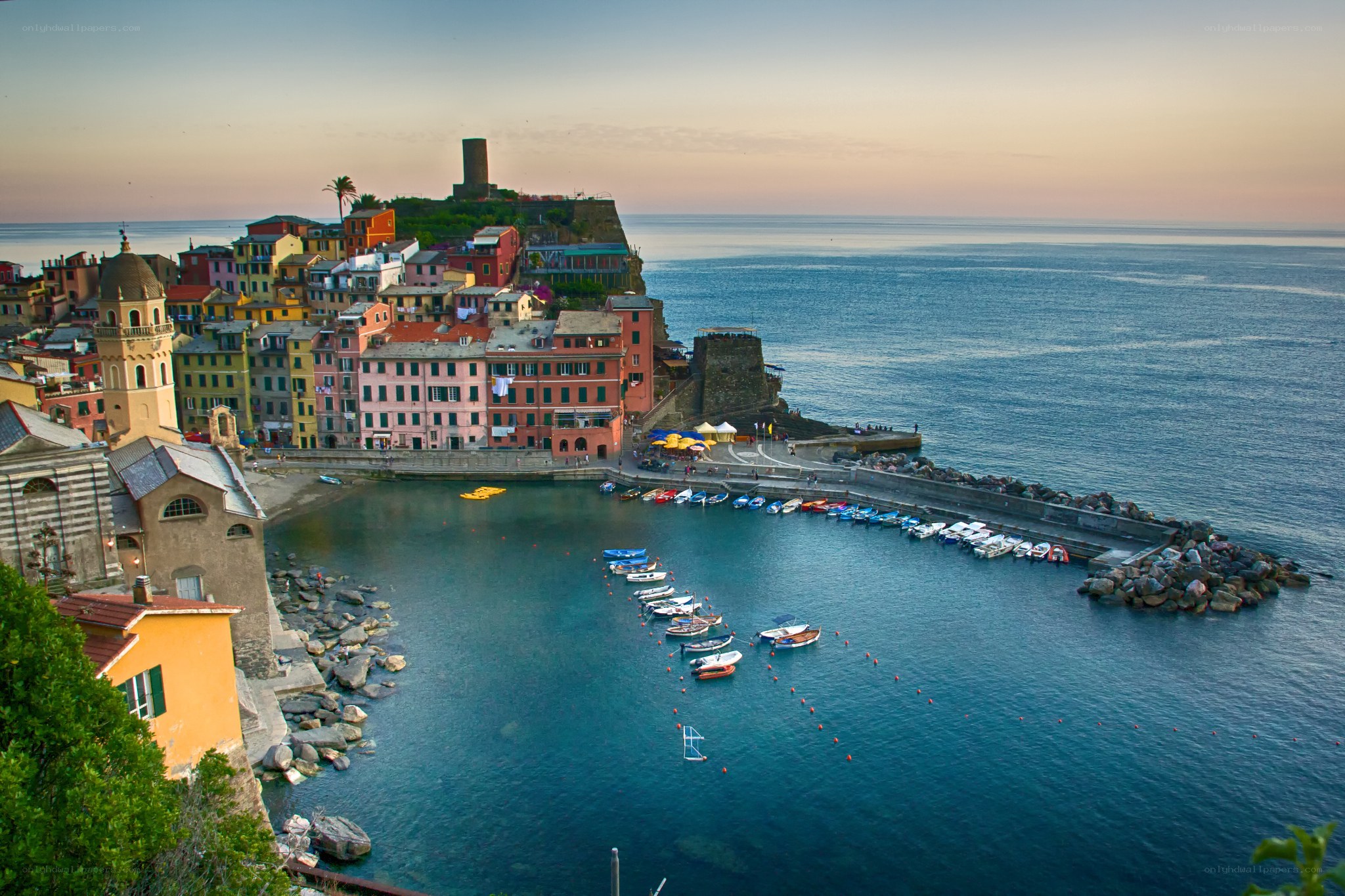 Colorful coastal village at sunset
