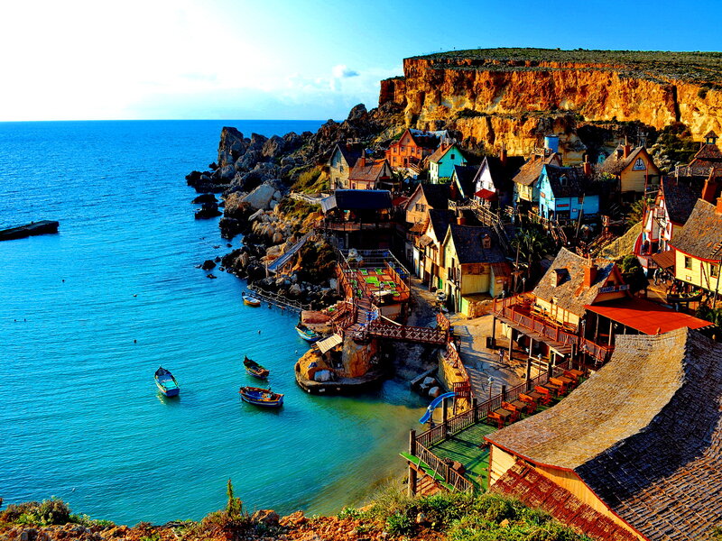 Colorful Coastal Village — Blue, Serene, Afternoon, Photograph
