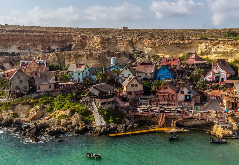 Colorful Coastal Village — Blue, Vibrant, Afternoon, Photograph, Cliffs