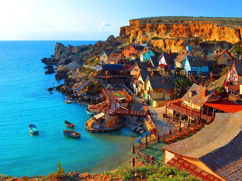 Colorful coastal village by the sea