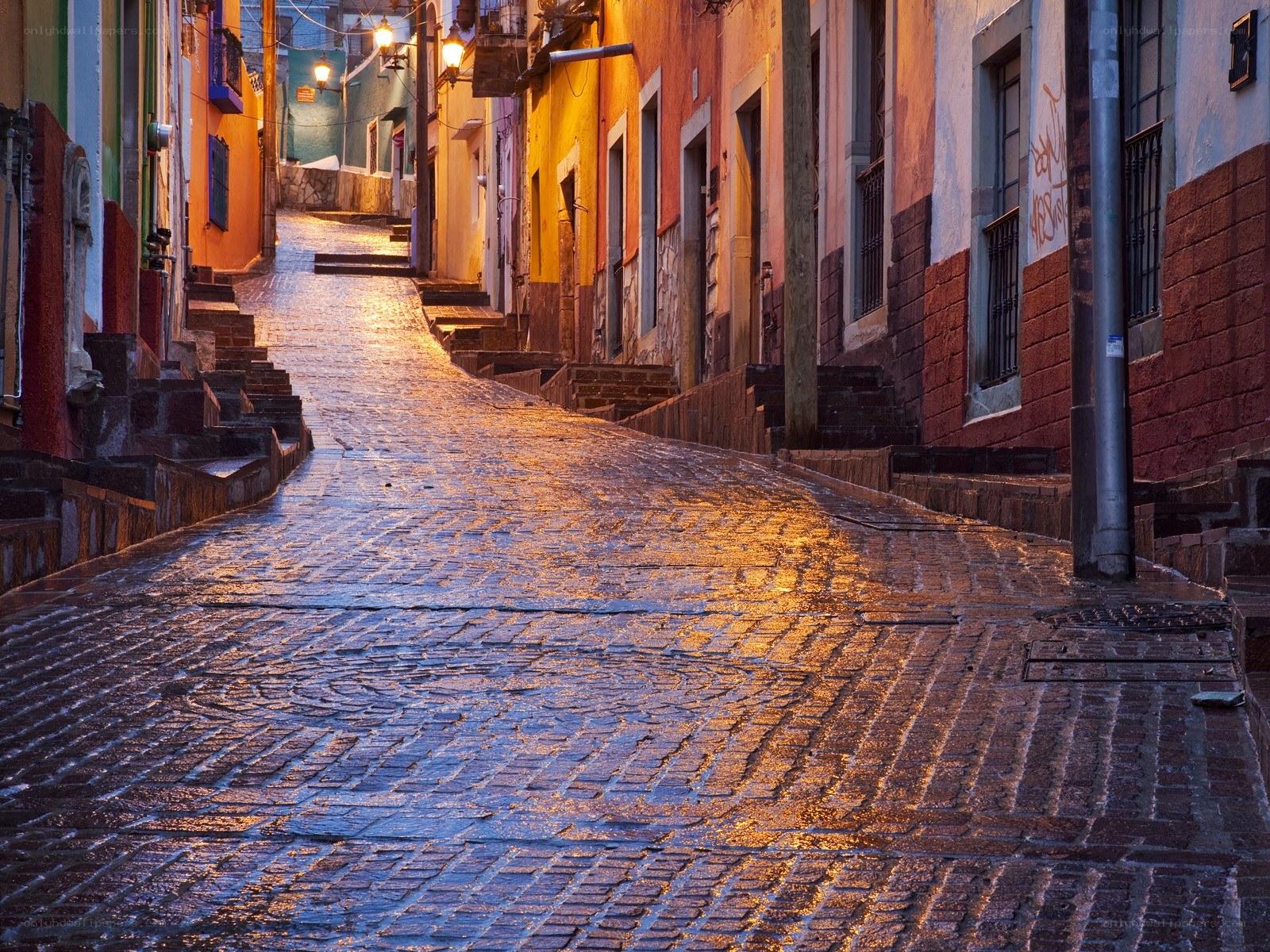 Colorful cobblestone street at dusk