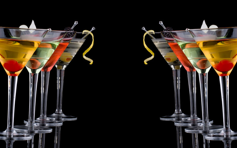 Colorful cocktails in martini glasses