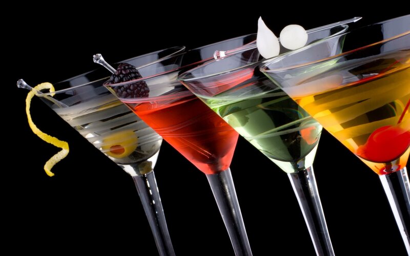 Colorful cocktails in martini glasses