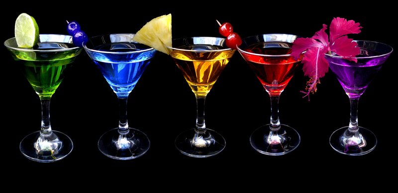 Colorful cocktails in martini glasses