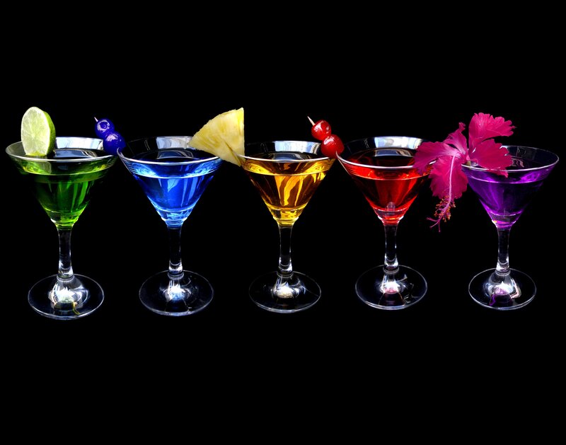 Colorful cocktails in martini glasses